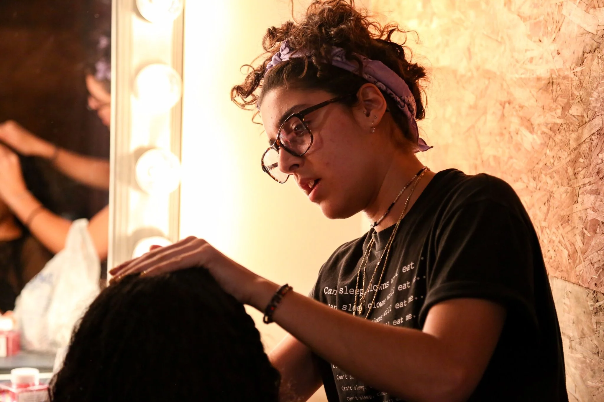 Cleaning blood off our lead protagonist, Asha Hall, before the next shot. 