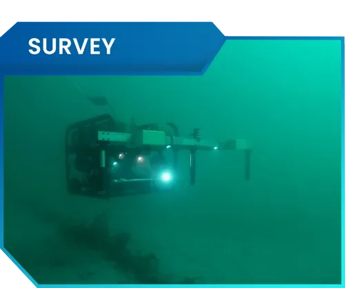 Underwater survey robot with lights exploring the ocean floor