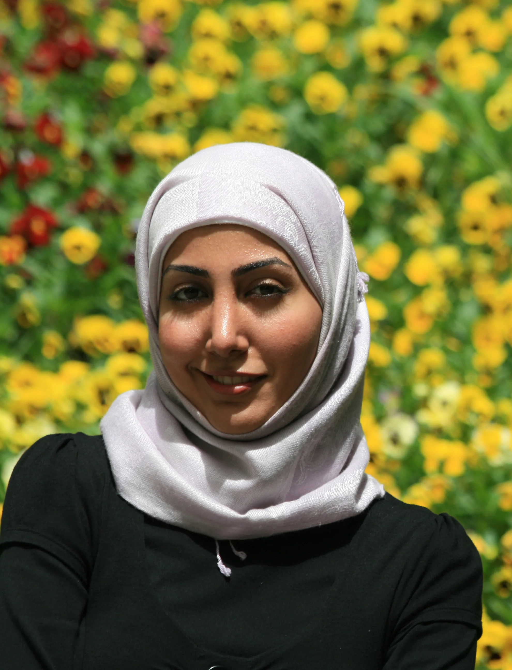 Copy of Woman&Flowers.Cropped.jpg