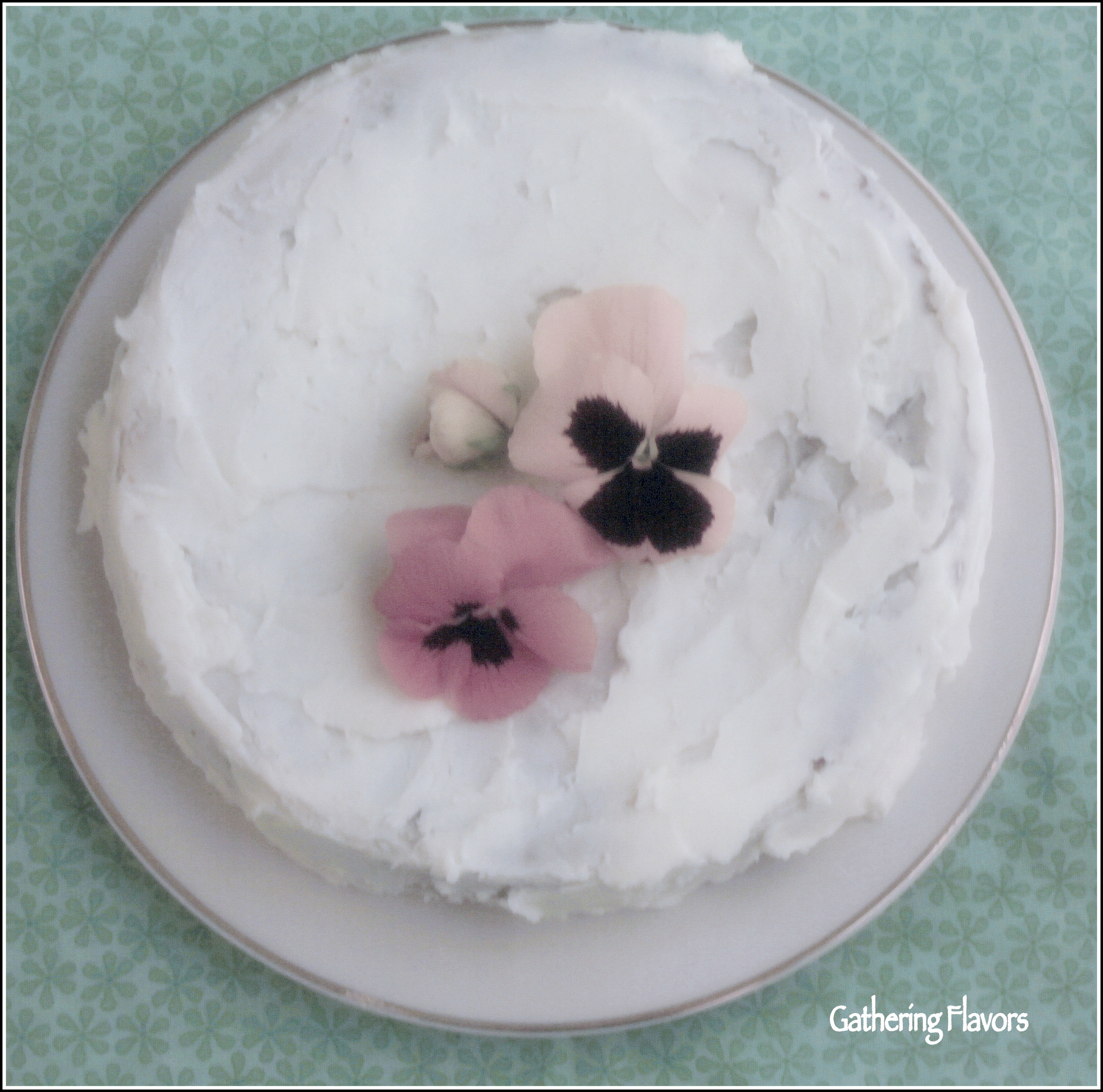 Golden Cake with Buttercream Frosting & Fresh Pansies for Mother's Day