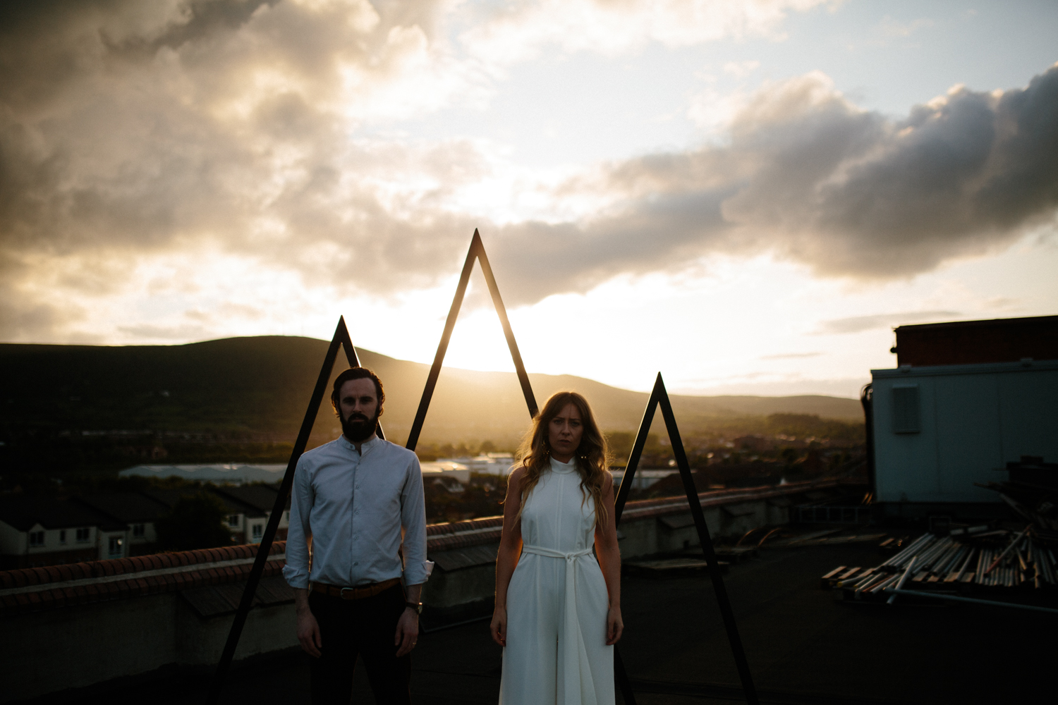 sunset couples shoot on Belfast city rooftop