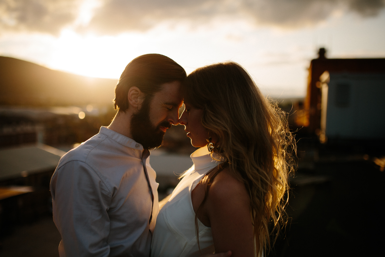 urban rooftop sunset engagement shoot