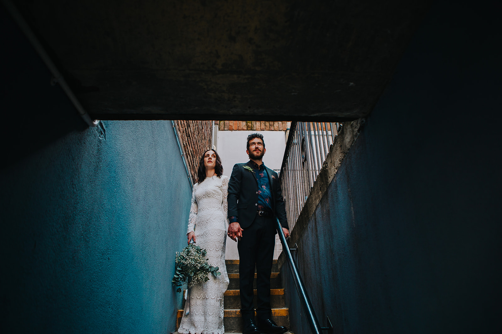 cool bride wearing Daughters of Simone Lola dress