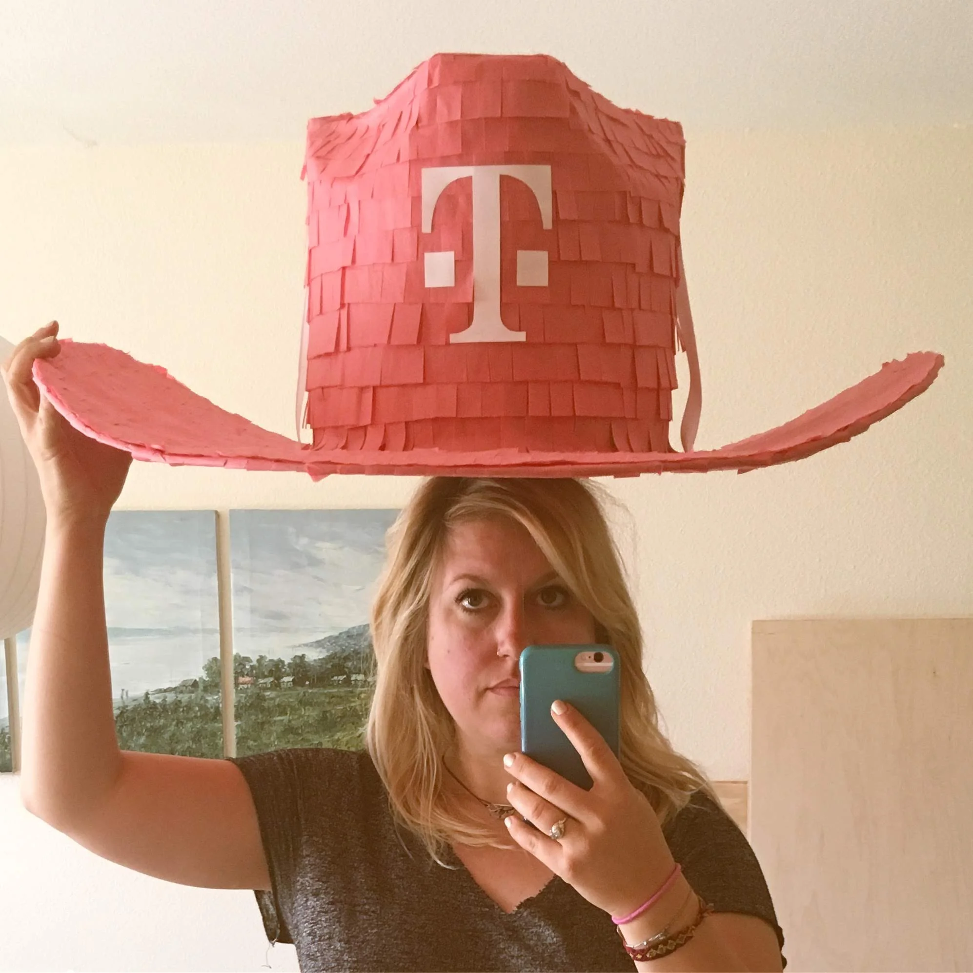  Xtra Large Pink Cowboy hat for a CEO at T-Mobile. 