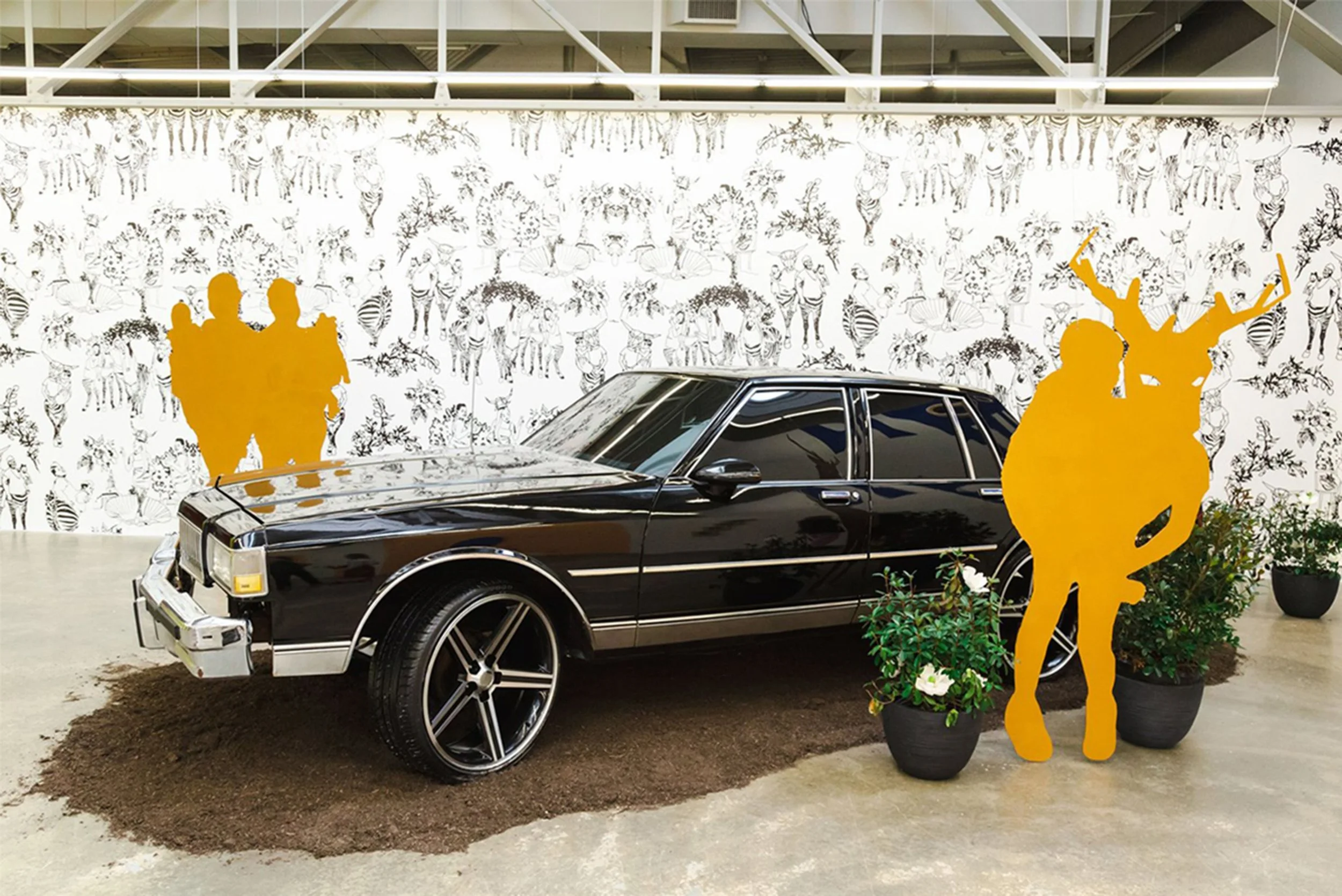 03_Gay_Shrine of the Black Madonna_Dimensions Variable_Installation Shot - Toile on Vinyl - Chevrolet Caprice - Aluminum Dibonds - Georgia Soil - Potted Magnolias.jpg