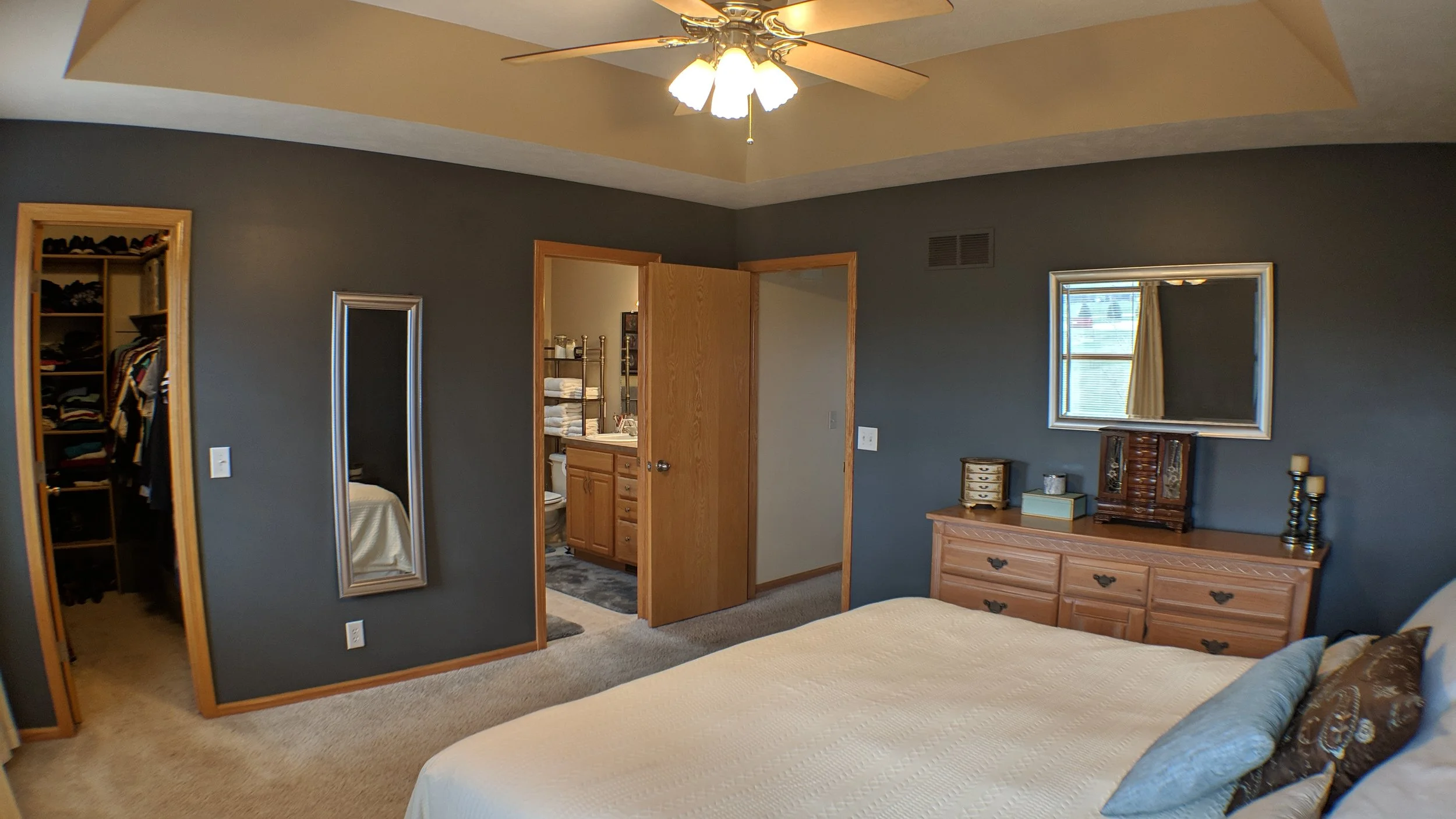 Large master suite with walk-in closet and double vanity.