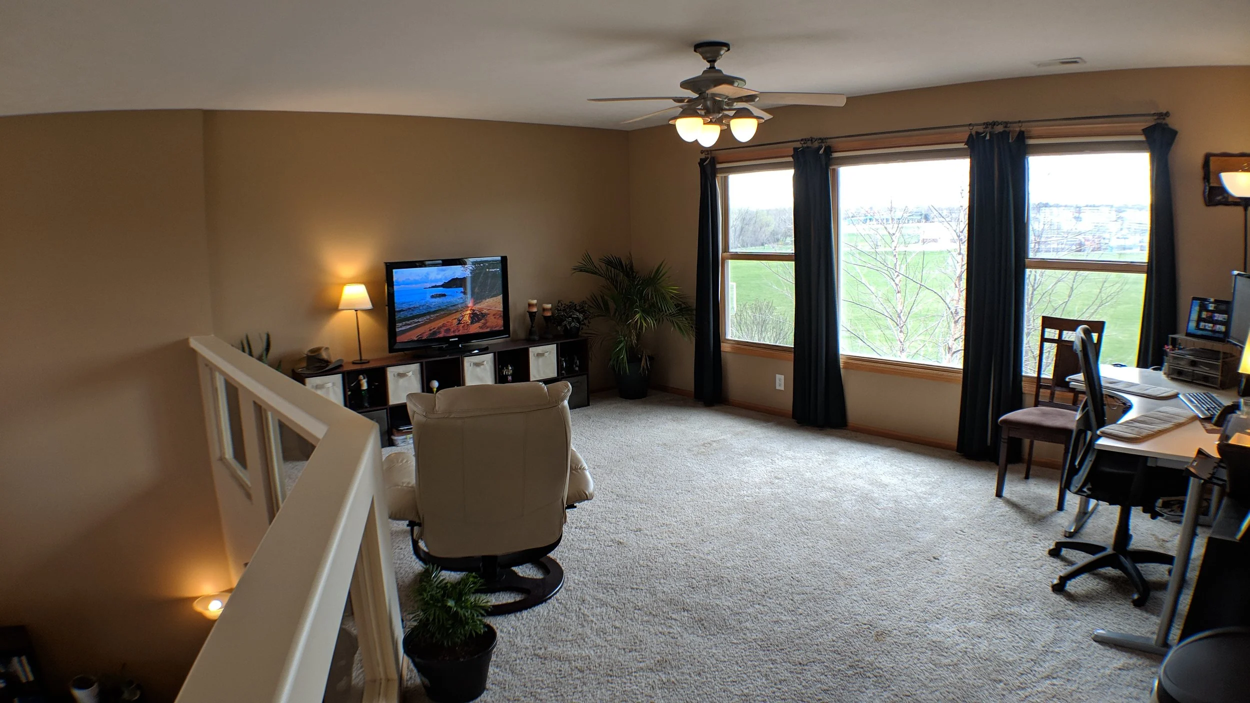 Large loft/office with view of open space and back yard retreat!