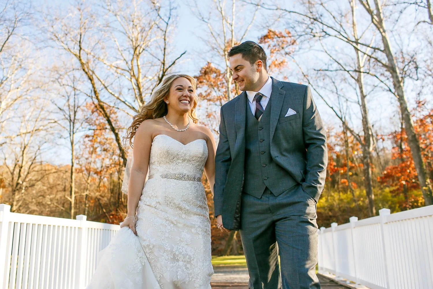 WED-Highlights-014-Bride-and-groom-share-a-happy-stroll-captured-by-lehigh-valley-wedding-photographer.JPG