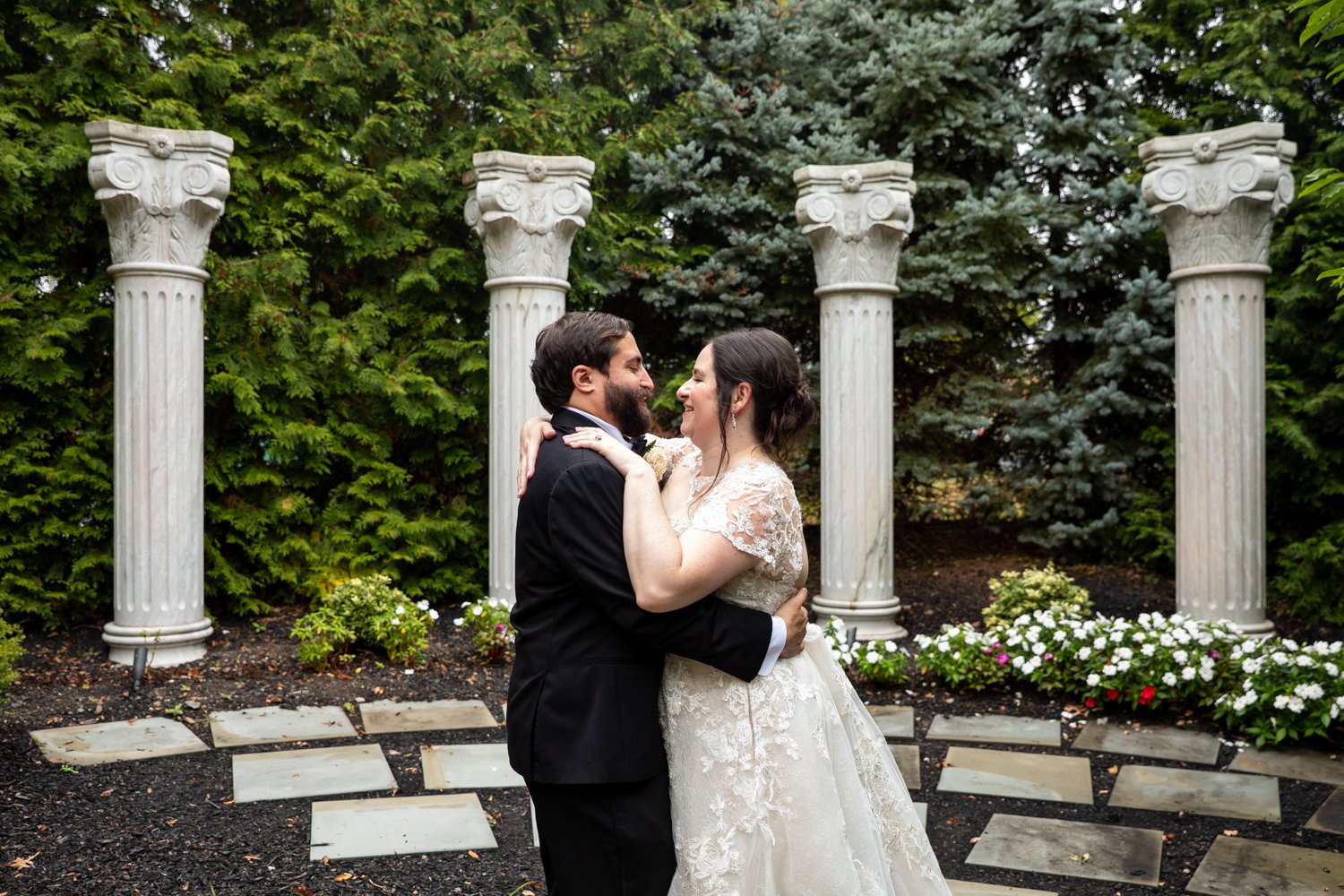 summer wedding at the waterfall in New Jersey portrait with columns
