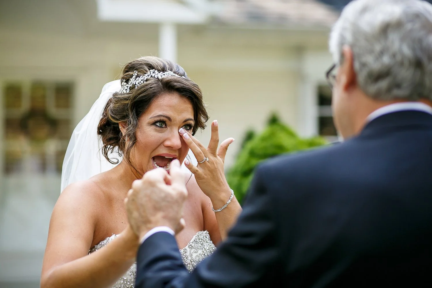 WED-Highlights-005-Bride-cries-at-the-first-look-with-her-dad-at-her-summer-wedding.JPG