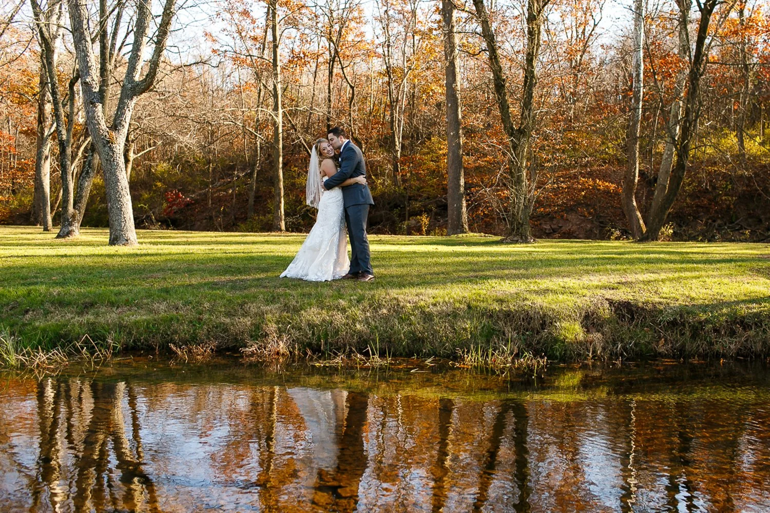 WED-Highlights-013-Lehigh-Valley-photographer-takes-a-stunning-reflection-portraot-of-the-newlyweds.JPG
