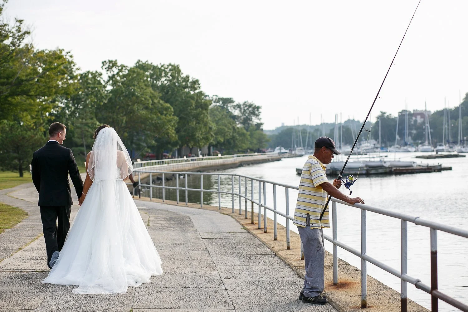 WED-Highlights-007-Newlyweds-share-a-walk-down-along-the-river-path-in-NewJersey-wedding.JPG