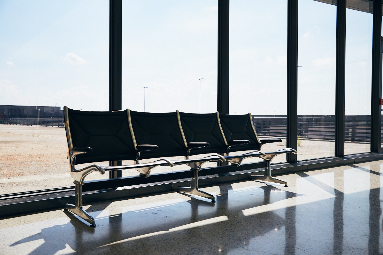 Quiet spot across from United Premier Ticketing on backside of terminal
