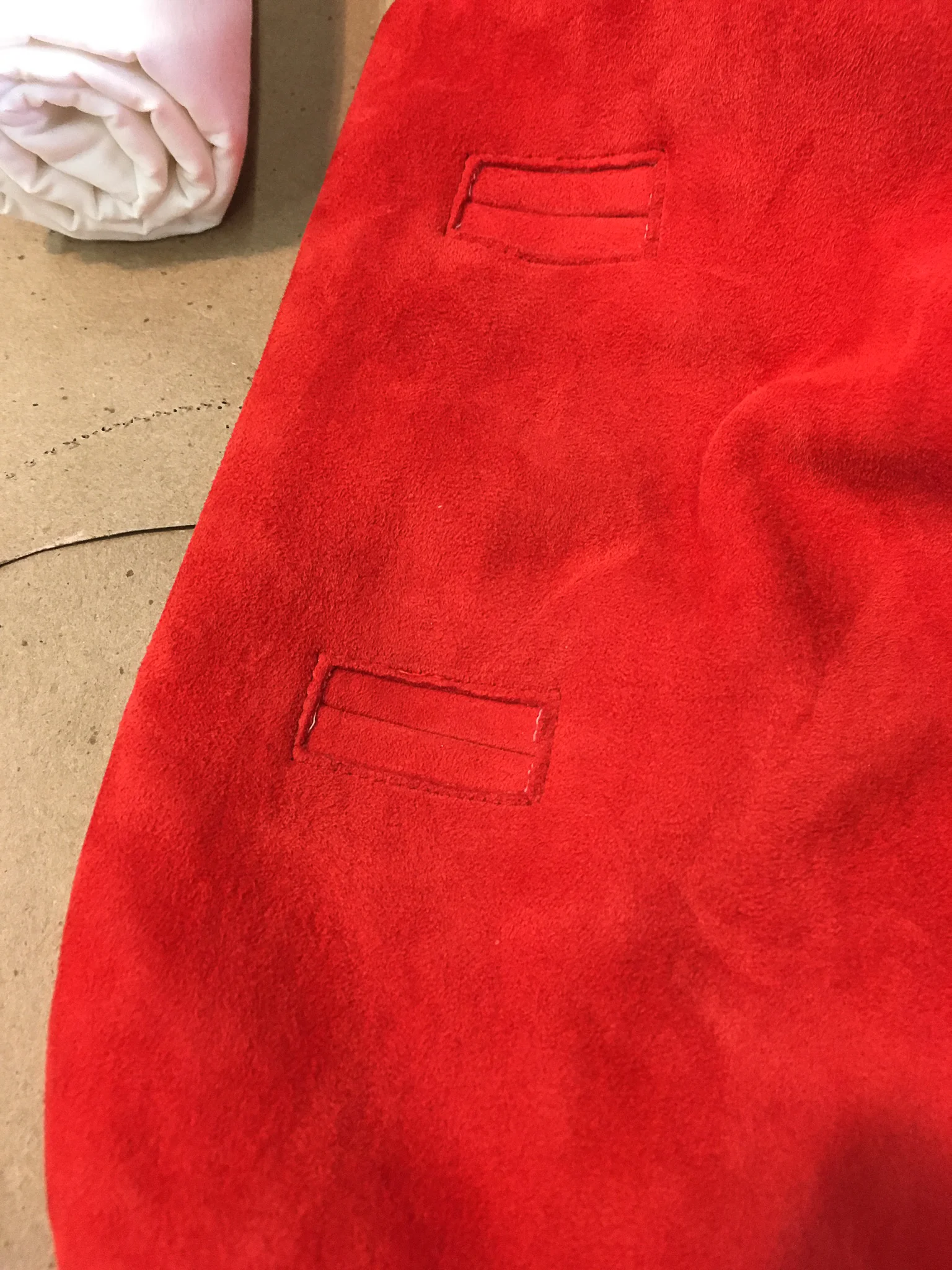   welt buttonholes in stretch suede The Barber of Seville /Washington National Opera/2018 design by James Scott/draping by AnaMarie Nelson   