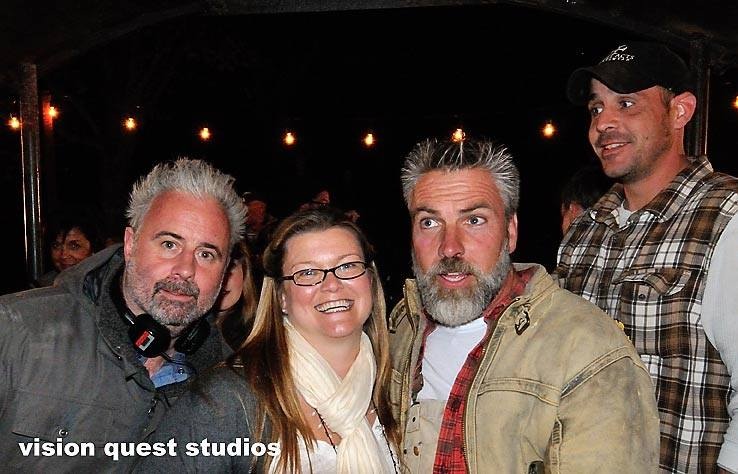Leigh poses with (from left) Director Paul McGuire, host Jay Chaikin, and one of Jay's crew.