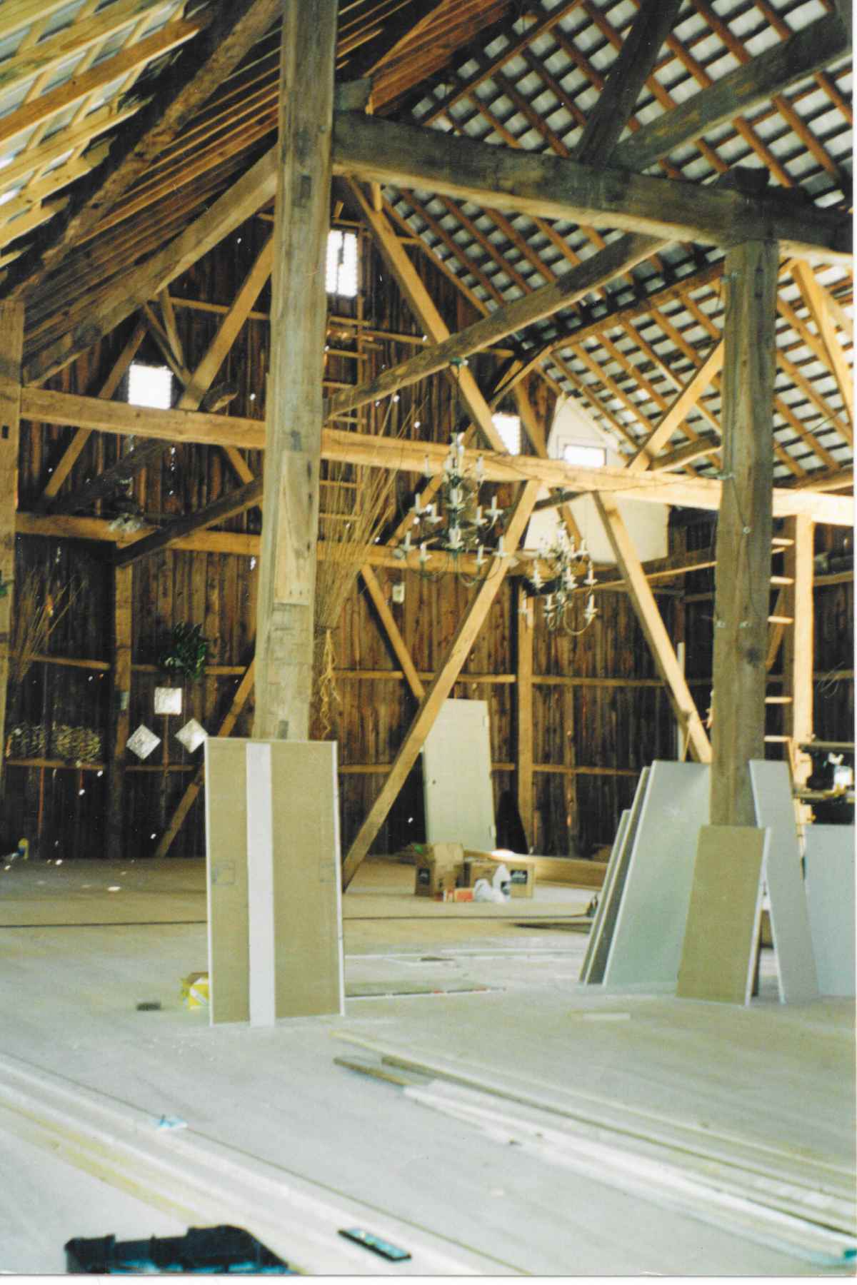 The top story of the barn at Chanteclaire Farm during renovation. The ceiling work has been completed, and work has begun on installing the gorgeous Ash hardwood floors.