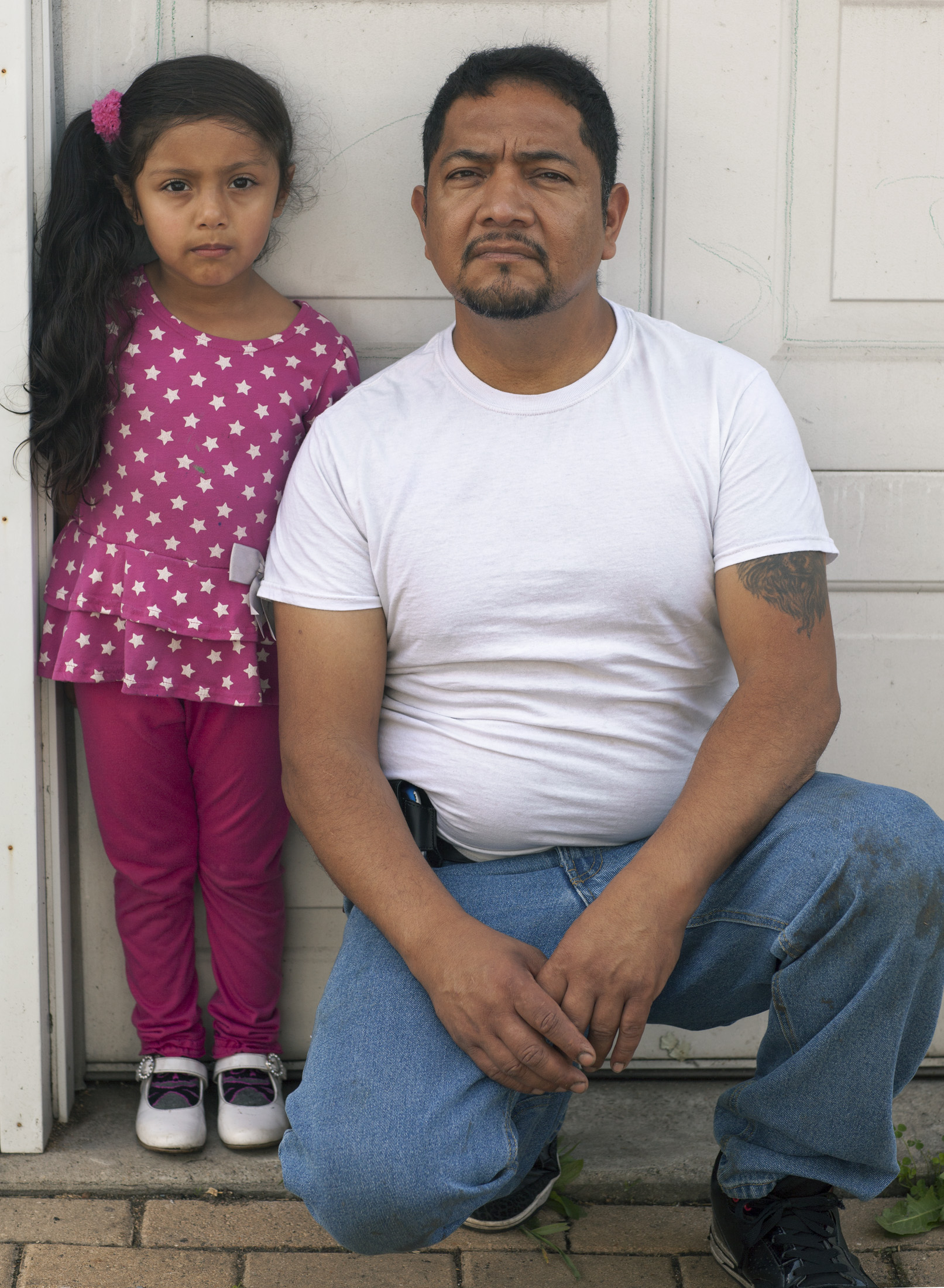 Martin Morales, activist, and his daughter, Scarlet, 2015. Terry Evans