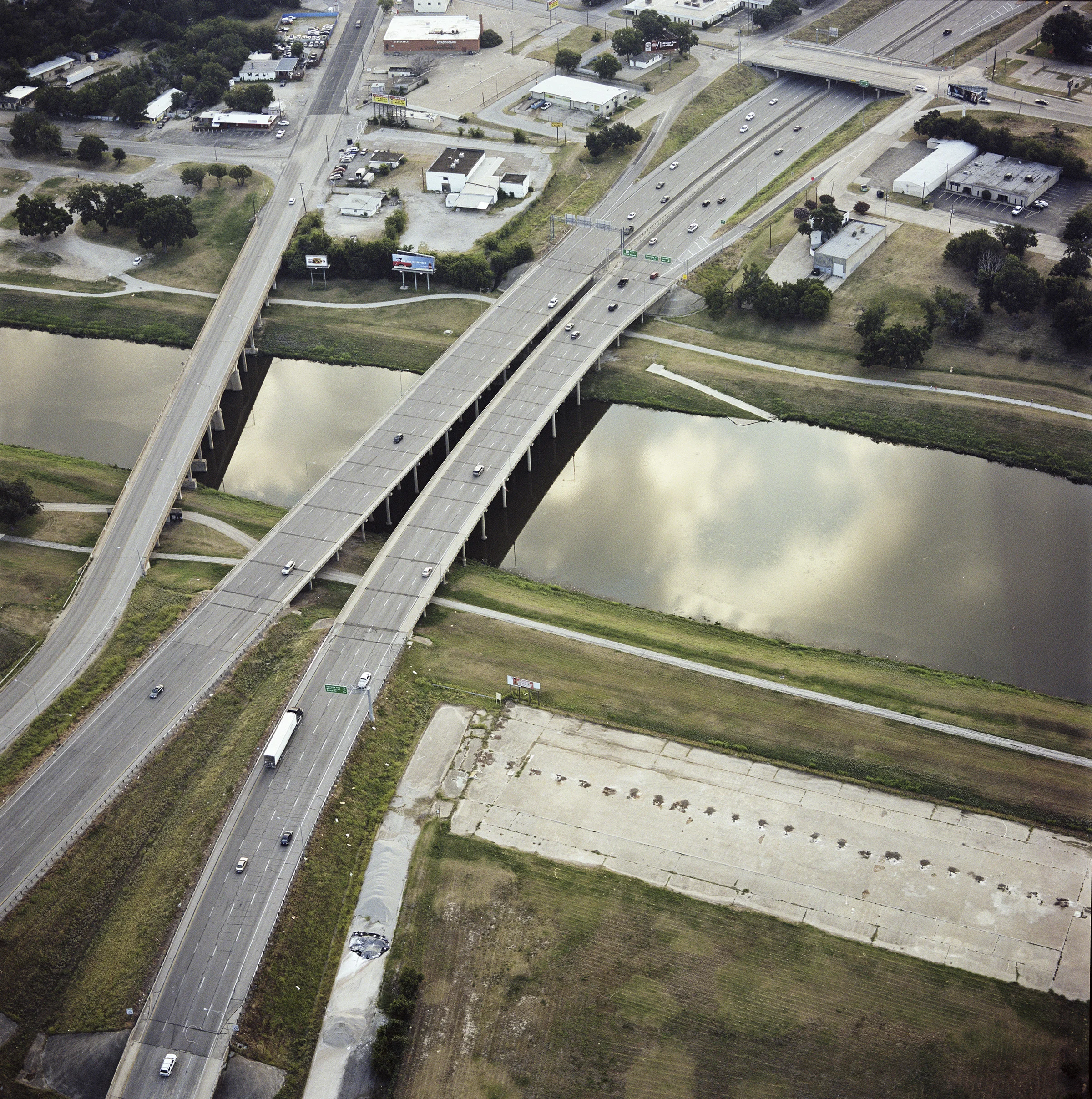 Highway 121/ Airport Freeway and Belknap Bridge over West Fork, Trinity River, July 5, 2013. Terry Evans