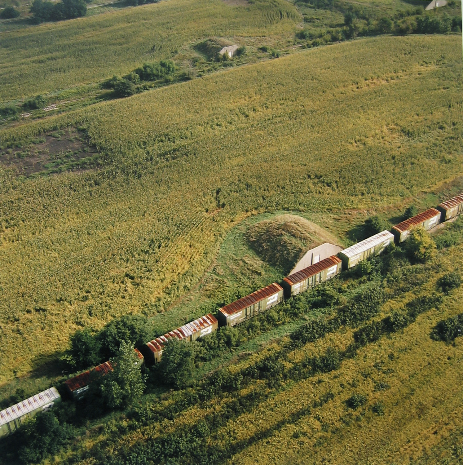 Abandoned bunkers and train, now a cornfield, September 1995