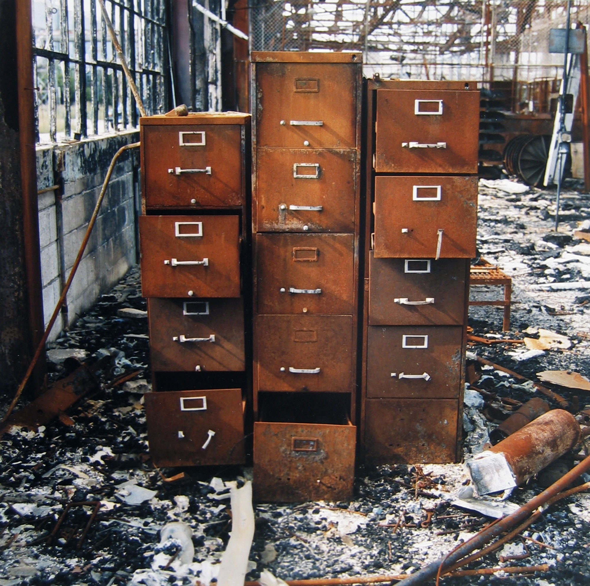 Abandoned main office building, with file cabinet, destroyed in December 1995 by fire, August 1, 1996