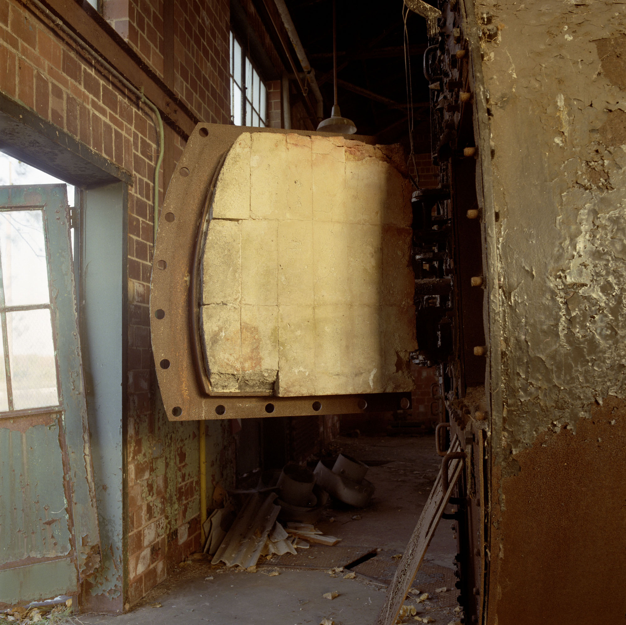 Furnace building, with door, east side, October 10, 1996