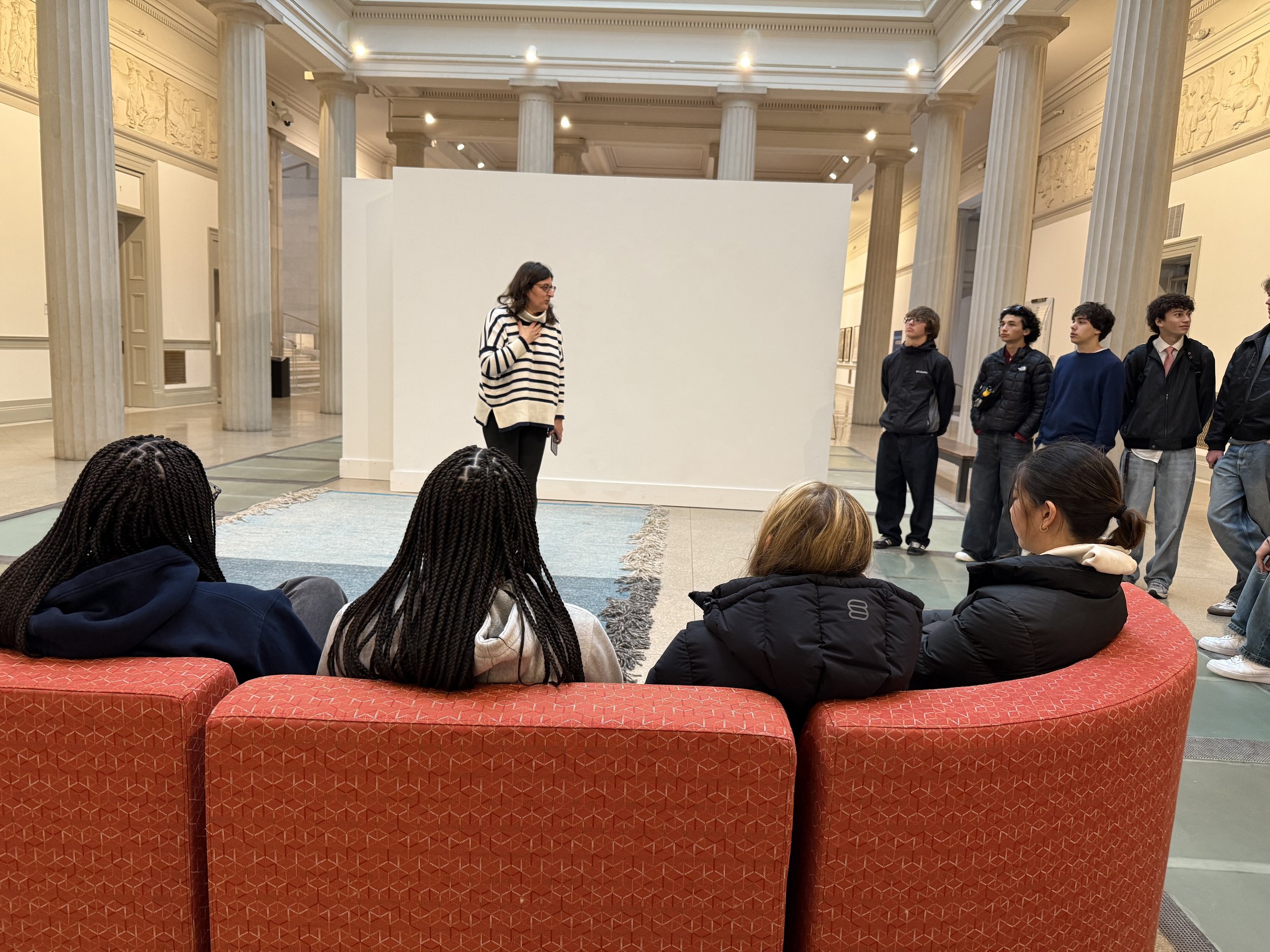 Students meet with a Professor of Art