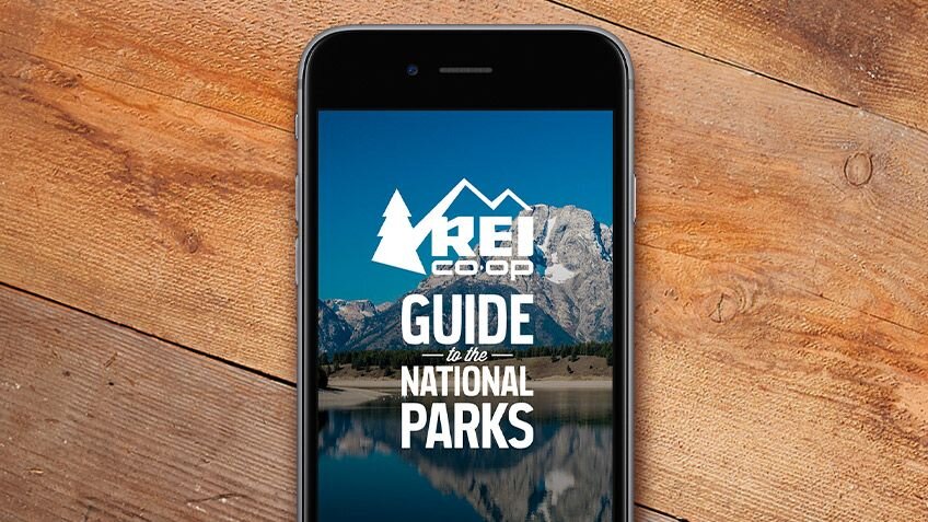 REI Co-Op National Parks Guide on a phone