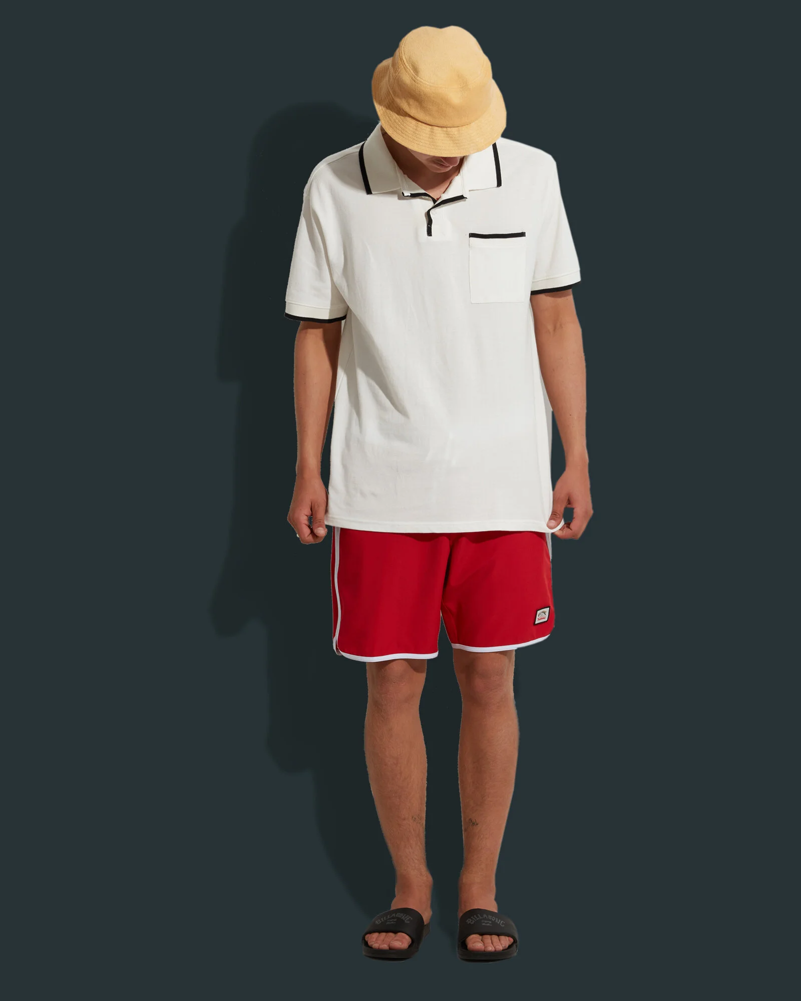 "Stubby Polo" - 70's style piqué Polo with jacquard stripe rib detailing for collaboration with Stubbies brand