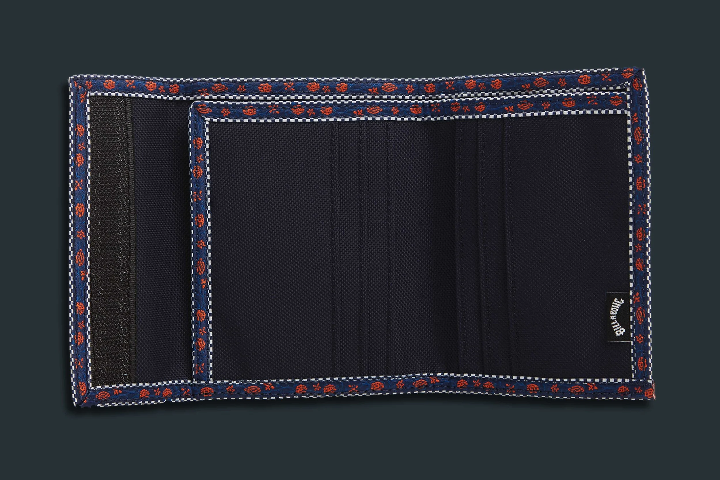 Corduroy, velcro wallet with nylon tape detailing and woven patch