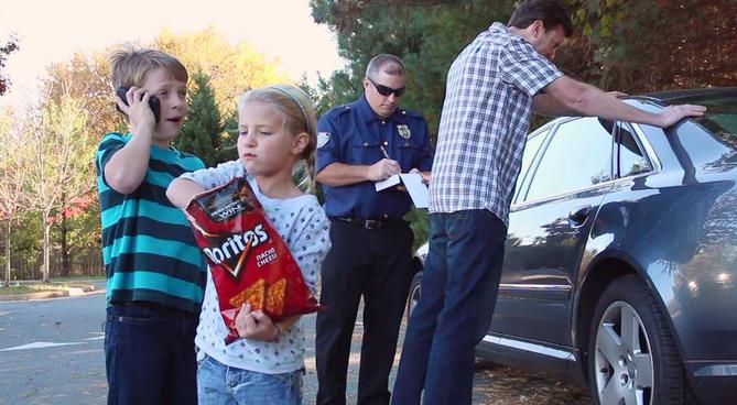 A family of 'unauthorized' Doritos smugglers. Dad takes the heat while Pip calls their attorney and Betsy tries to get rid of the evidence. A sad scene played out all across America. Note Betsy's look of defiance. 