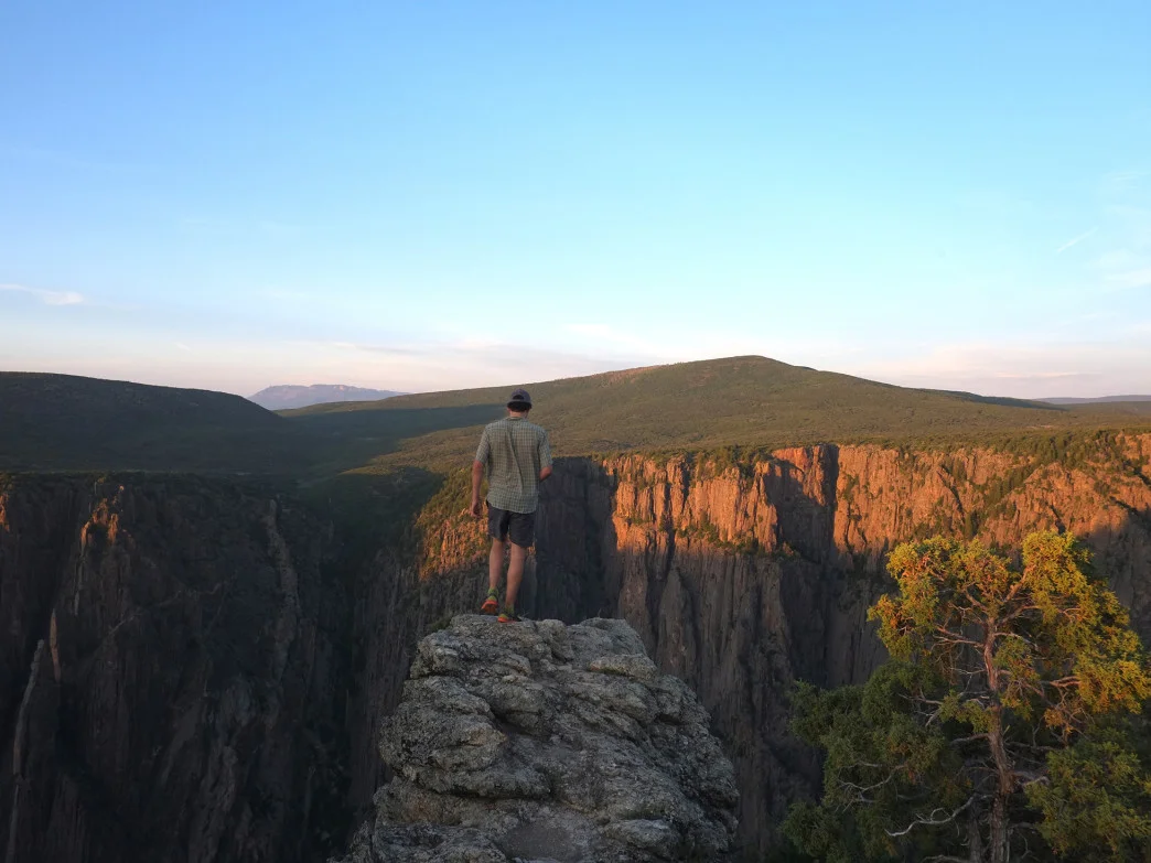 Standing on the edge of Black Canyon. It was only at the last minute that Harry "The Bird" Mybox, realized he had forgotten his wing suit. 