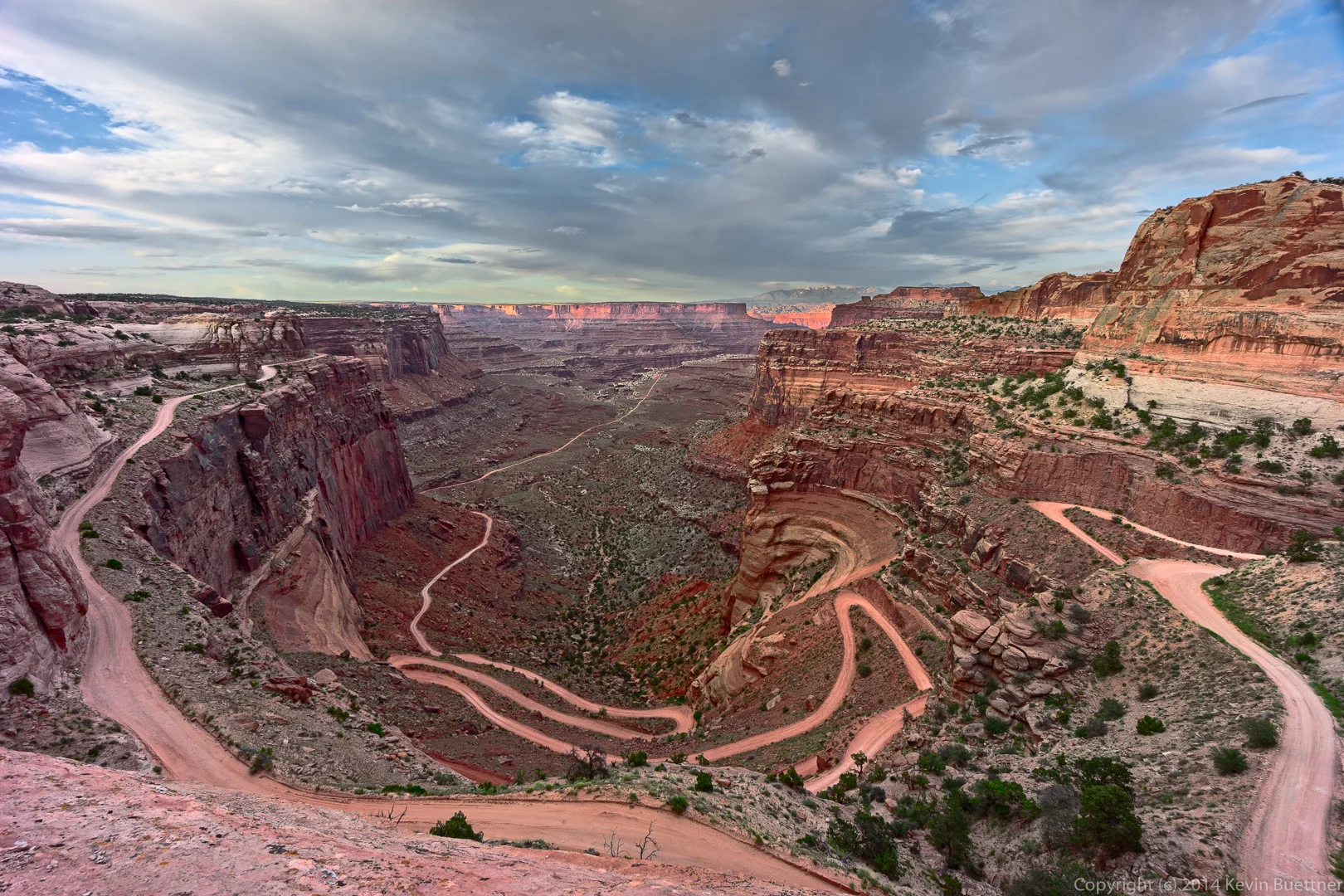 The notoriously dangerous Shafer Trail. The small speck behind a boulder at the bottom is The Bearded Man. We told him to use the bathroom before getting in the van. 