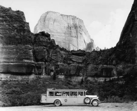 The closest Uber - Seen here dropping off his last fare in Zion National Park. The driver, 78 year old Mahnoor Bajwa, is struggling to cover fuel costs for his modified tour bus and is actively searching cars.com for a used Prius.