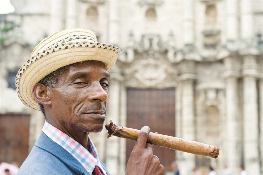 Mickey Machado, The Bearded Man's Cuban connection, sporting a hand rolled Havana Hoagie. If you nurse it, a Hoagie can last up to 4 hours. If you just blow thru it, the back of your head may explode.