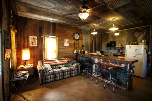 The sitting room/bar portion of my suite at Shakesdale. I woke up in my bed so I know there was a bedroom. Watermelon Slim slept on the bar.