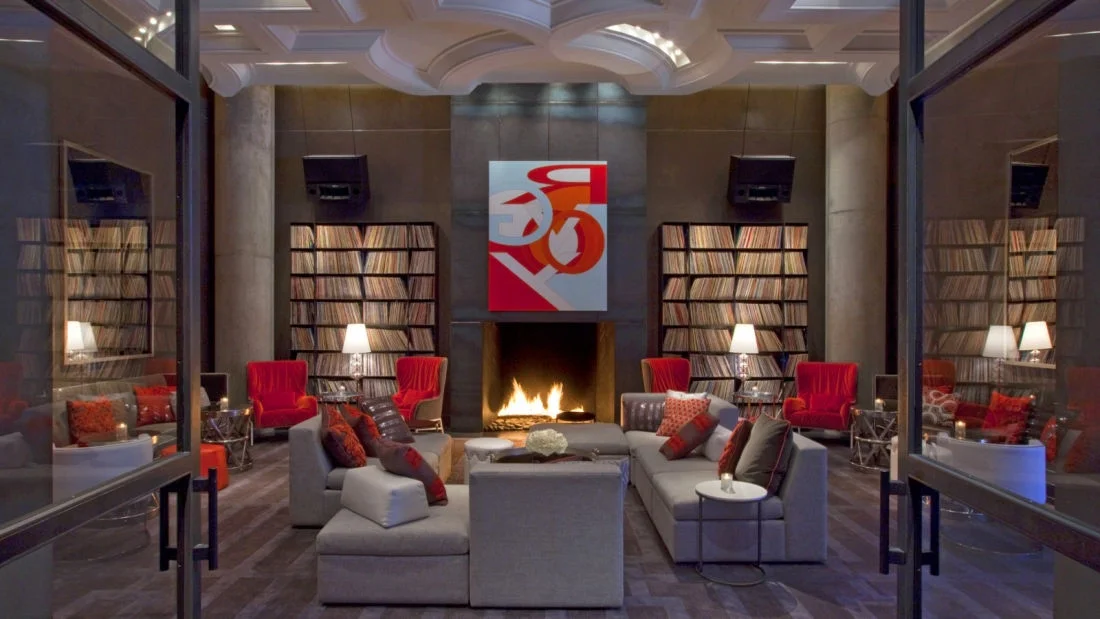 The 'living room' at the W Hotel in downtown Austin, Texas. They kicked me out of this room three times during the night. I just wanted to sleep on the couch. The third time they were upset because I had taken some pillows off the couch and fell asleep in front of the fireplace. 