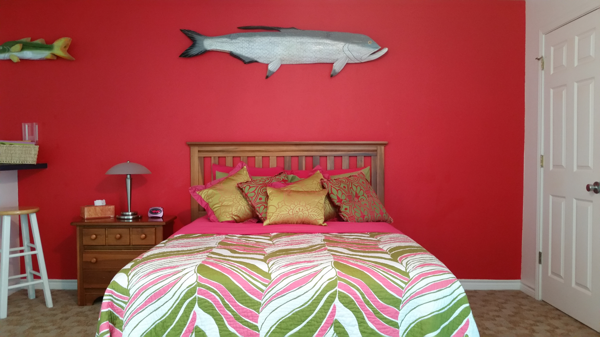 My bedroom at the Poco Loco Lodge. That's not a marlin on the wall - The marlin was in the other room. Those are pillows on the bed. Lots and lots of pillows. I bet the owner knows the decorator at the W.