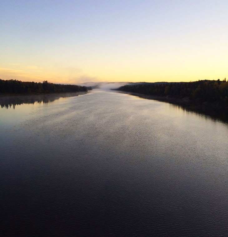 WATER, LIGHT AND LAND ON A FOGGY MORNING ABOVE LAKE SUPERIOR.