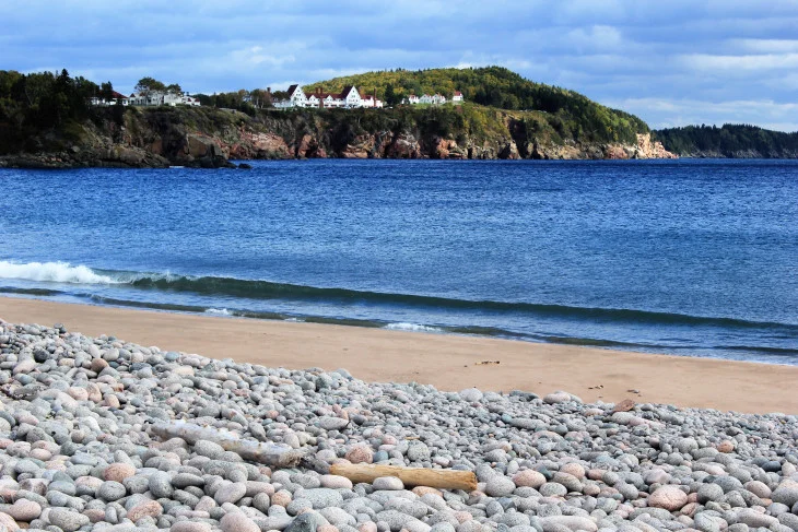 INGONISH BEACH WITH THE KELTIC LODGE ACROSS THE BAY. I ONLY STUBBED MY TOES 3 TIMES BEFORE REACHING THE SAND. DIDN’T MATTER. I COULDN’T FEEL MY TOES AFTER DIPPING IN THE ATLANTIC.