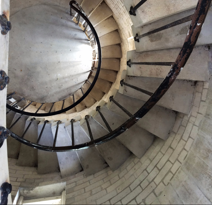STAIRCASE LEADING TO THE LIGHTHOUSE OBSERVATION TOWER. CANT’T CLIMB WITHOUT THINKING OF A BUTTON SEA SHELL. OR ALFRED HITCHCOCK.