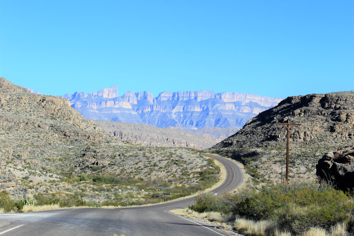 Sierra Del Carmen from a distance of approximately 20 miles. Not until you stand directly in front of these canyon walls can you appreciate their sheer scale. Same logic applies to looking at my head.
