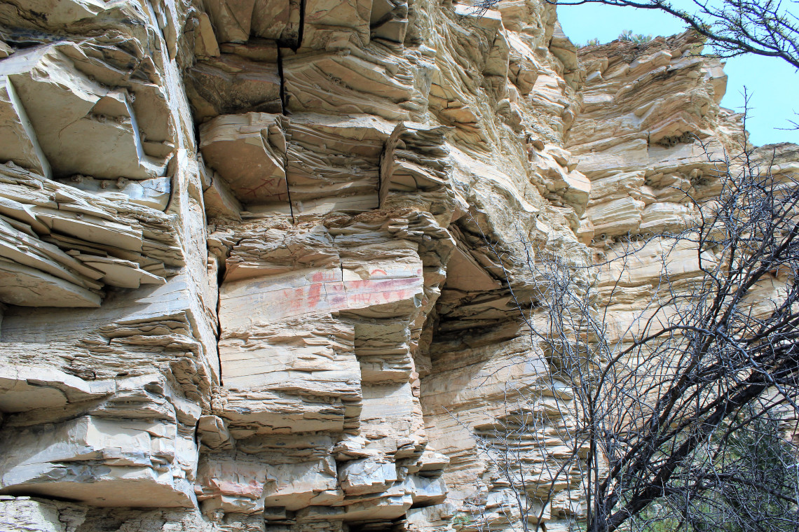 High cliff Indian pictographs on the trail to the hot springs. This one says Sitting Bear Was Here.