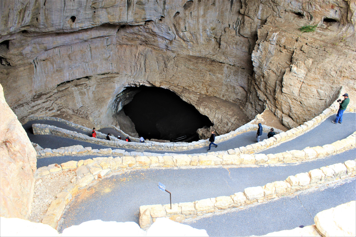 The steep switch-back trail into cave drops over 200 feet before you enter. A heard a young man in front of me tell his girlfriend he was dizzy. She called him a name that began with ‘p’ and he kept walking.