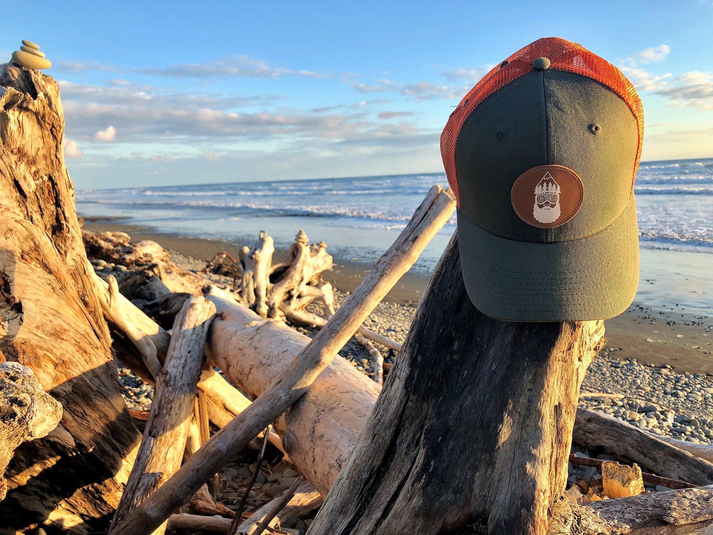 TMC hat on beach.JPG