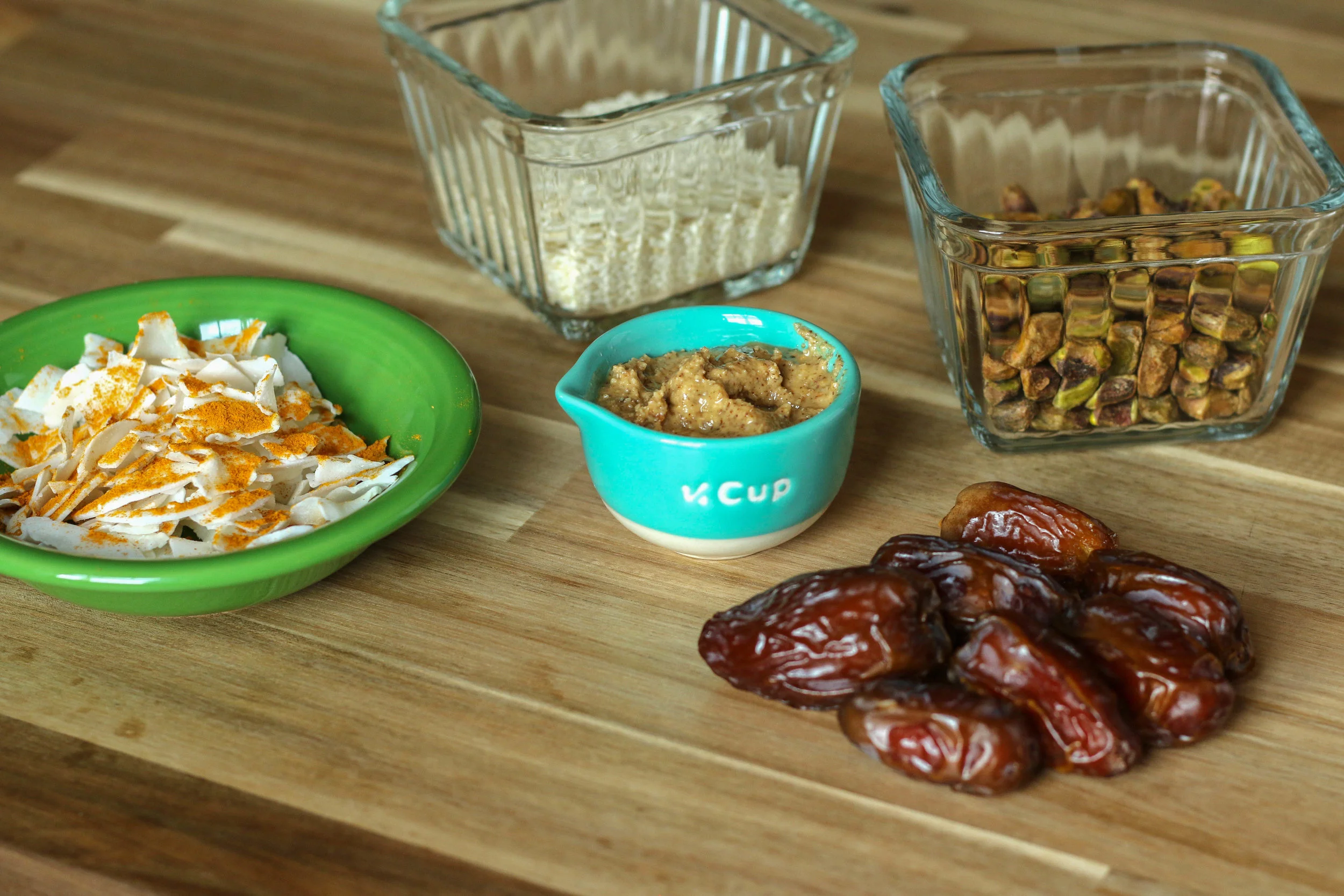 A note on dates : When blending large quantities, try your best to find 'fresh' medjool dates. You can tell if they feel soft and pliable , vs hard and dried out. The soft texture will allow them to blend easier AND yields the best texture for the energy balls! 