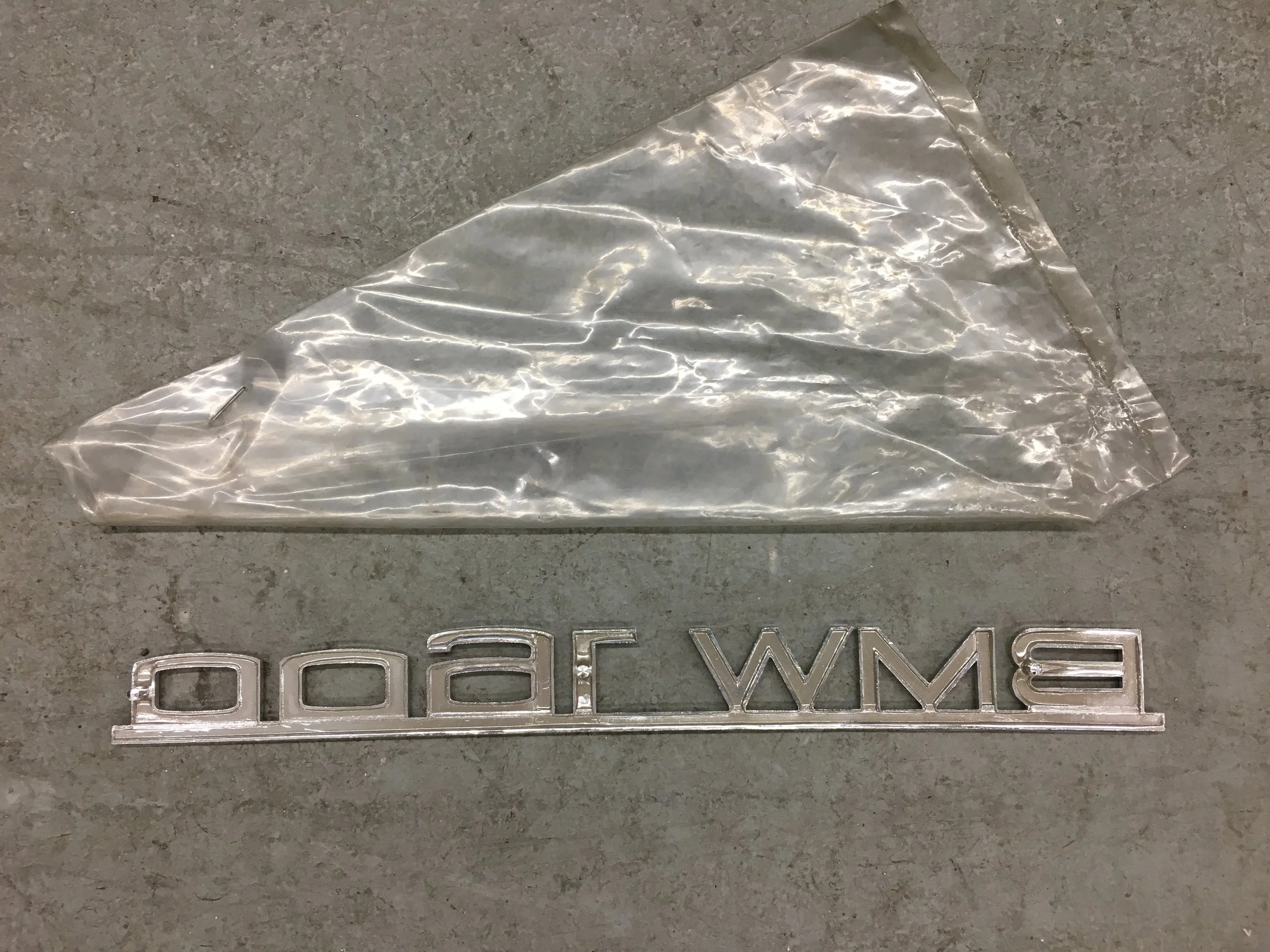 NOS Early 1600 Badge rear.JPG