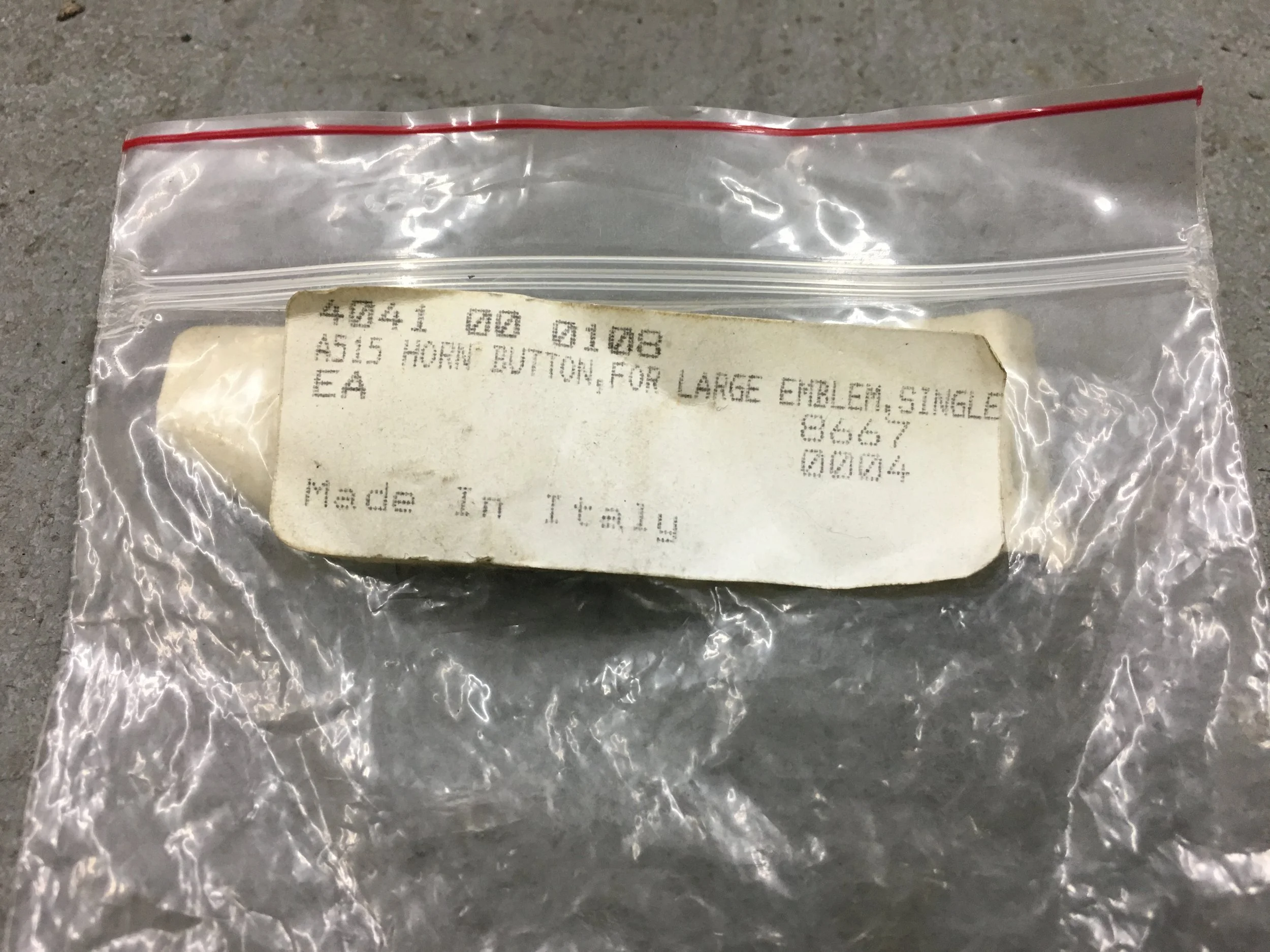 Porsche Nardi Horn Button label 1.JPG