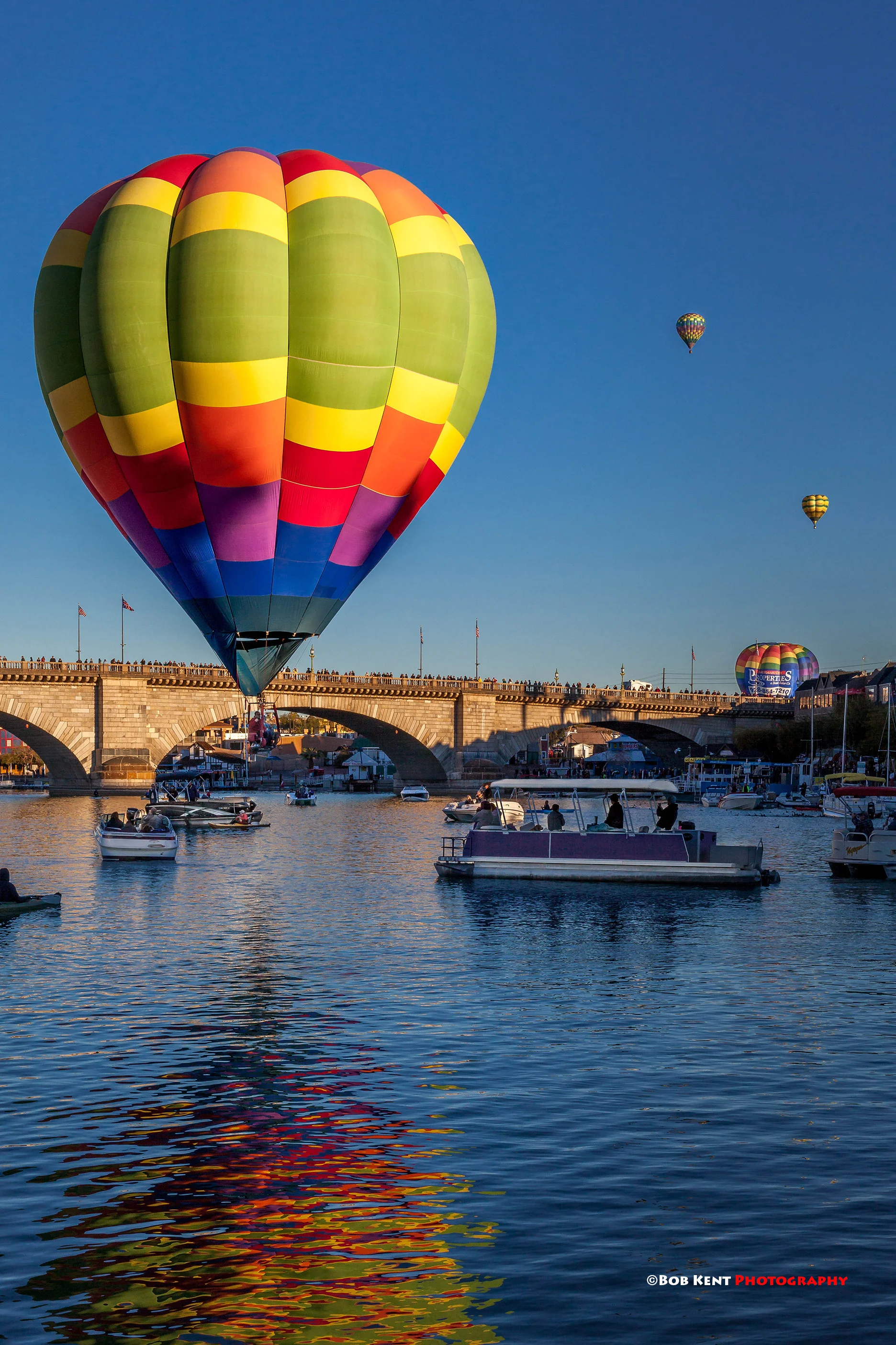 The Elevation II performing for the crowd and making a colorful reflection