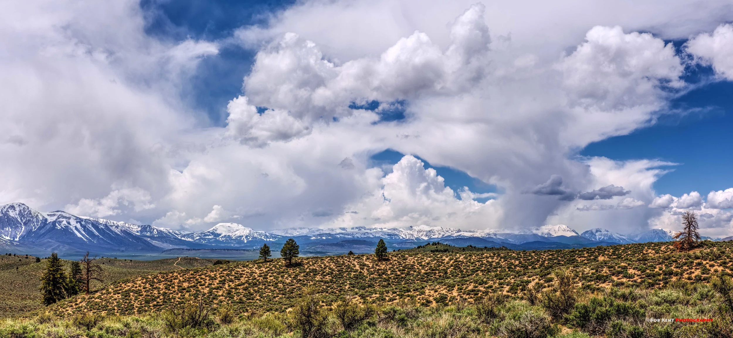 Storms over the Eastern Sierra. Lots of snow still on Mammoth!