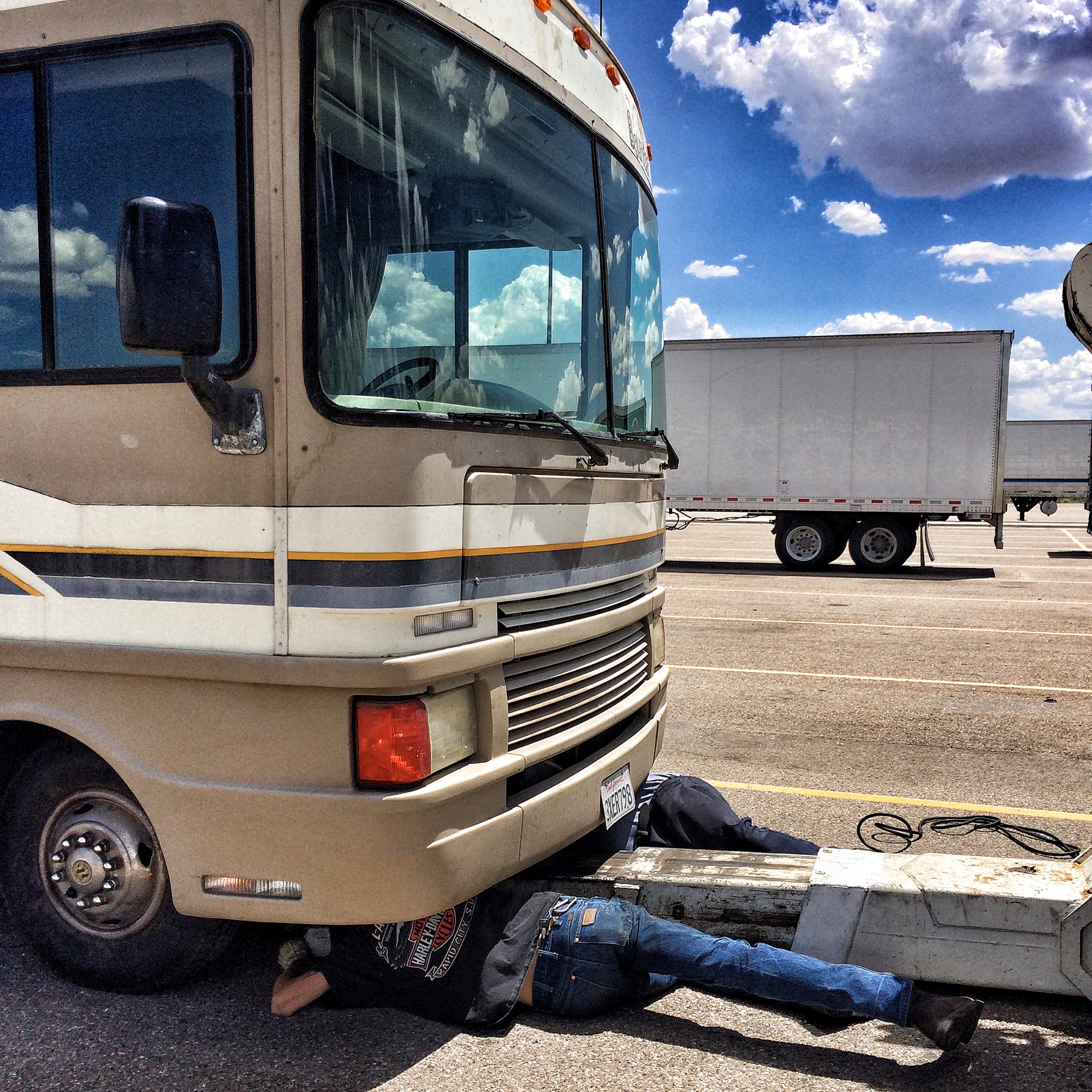 My caption for this photo that day on Instagram: At one point while these nice guys struggled with my stubborn motorhome to get her towable, I kind of hiccup-giggled because the thought crossed my mind that my diva motorhome just wanted men underneath her again. That was better than screaming to the heavens or dissolving into crying fits, but those emotive states are rather near the surface just yet.